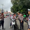 Polres Bitung Ajak Warga Kibarkan Semangat Merah Putih di – HUT – RI ke – 80